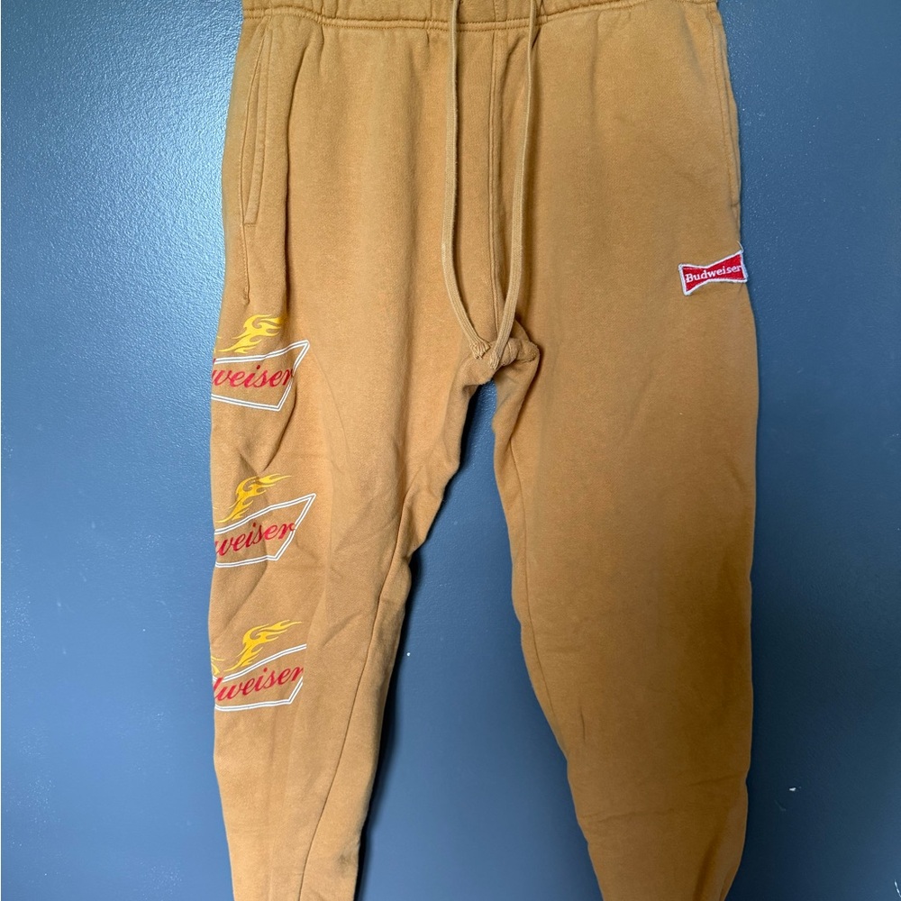 Budweiser Tan Joggers with Red and Yellow Accents